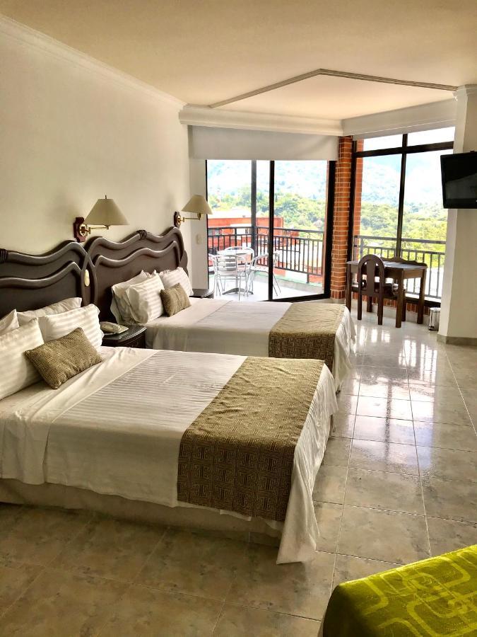 Casa Morales Hotel Internacional y Centro de Convenciones Ibagué Habitación foto